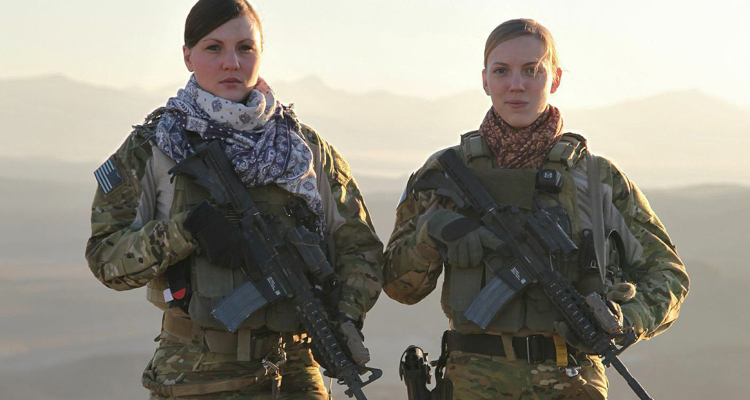 two heavily armed women military special operators